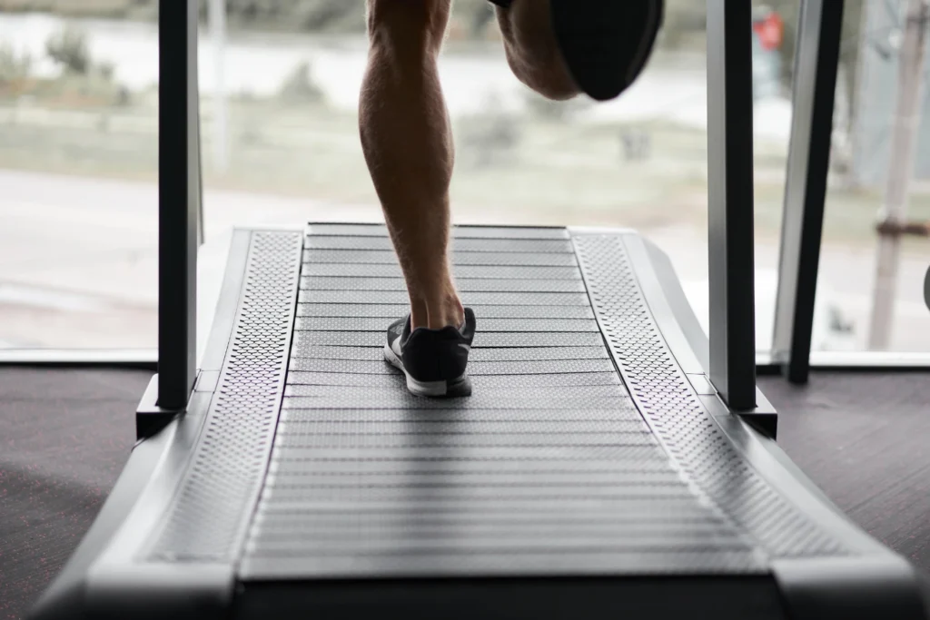 sports rehab runner on curved threadmill