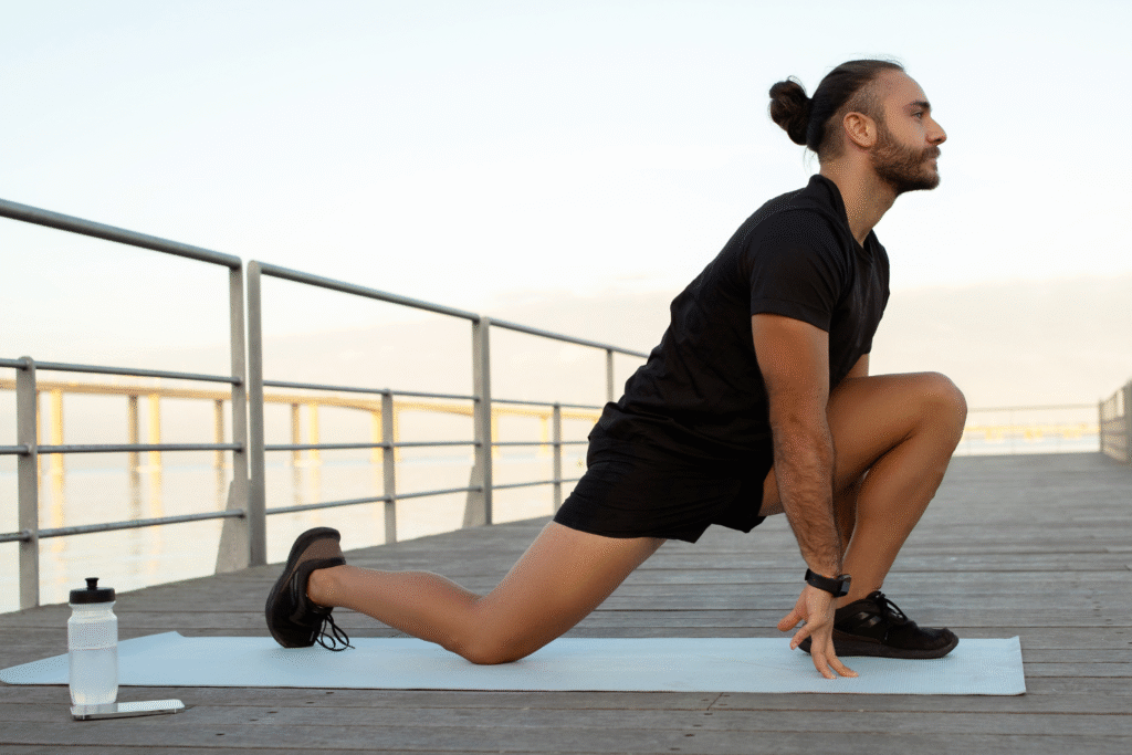 runners stretching their tight hip flexors