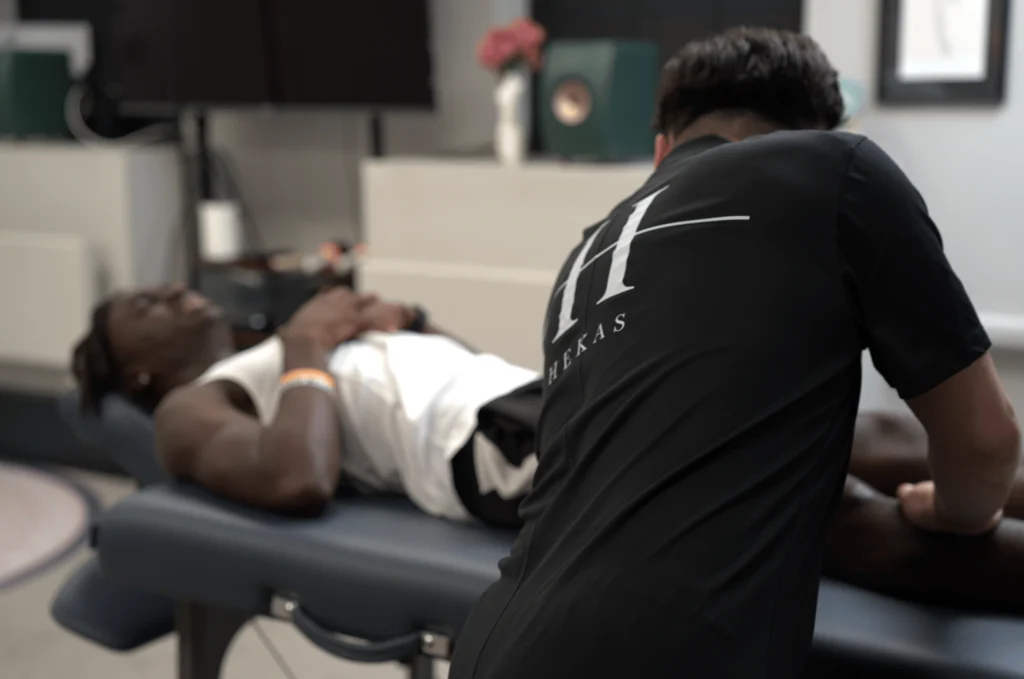 A professional footballer having an off-season recovery session
